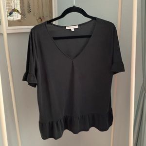 Green envelope Los Angeles size large black ruffle sleeve and bottom T-shirt